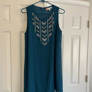 Boutique blue New Year’s Eve dress. Size Large with sequin detail.